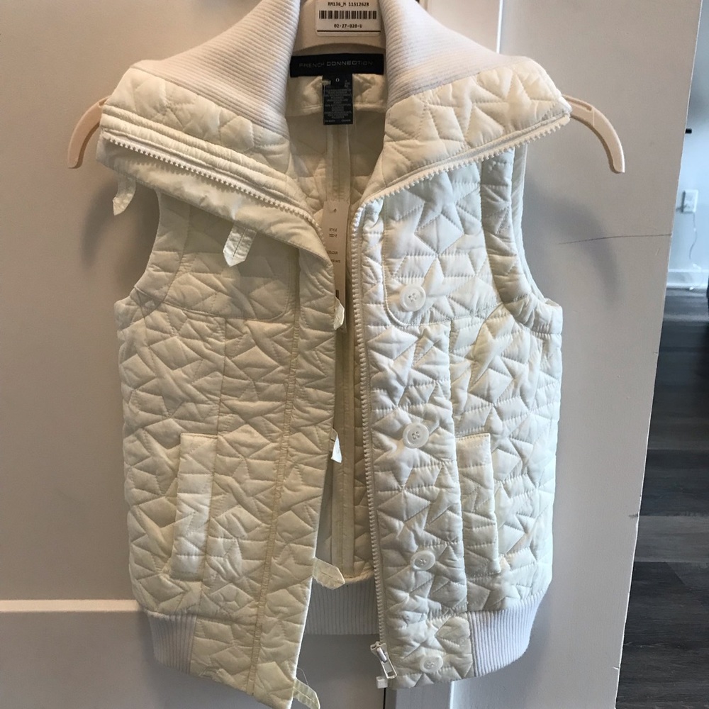 Off white sleeveless French Connection vest.